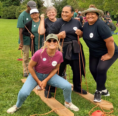 Deane staff participating in a challenge